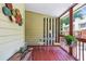 Charming screened porch with decorative accents and a peaceful ambiance at 1386 Sheffield Glen Ne Way, Atlanta, GA 30329