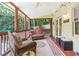 Relaxing screened porch with comfortable seating and scenic views of the outdoors at 1386 Sheffield Glen Ne Way, Atlanta, GA 30329