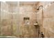 Beautiful tiled shower featuring glass door and built-in shelf at 1386 Sheffield Glen Ne Way, Atlanta, GA 30329