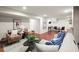 Finished basement with seating area, table and chairs at 2148 Allgood Rd, Marietta, GA 30062