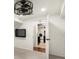 Basement room with ceiling fan and laundry room access at 2148 Allgood Rd, Marietta, GA 30062