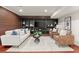 Finished basement featuring a large entertainment center and modern decor at 2148 Allgood Rd, Marietta, GA 30062