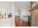 Inviting foyer with hardwood floors, decorative railing, neutral walls, and an open floor plan that flows into the living spaces at 2148 Allgood Rd, Marietta, GA 30062