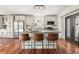 Bright kitchen featuring an island with seating, stainless steel appliances, and a view to the outside at 2148 Allgood Rd, Marietta, GA 30062