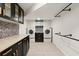 Well-organized laundry room with modern appliances and stylish cabinetry at 2148 Allgood Rd, Marietta, GA 30062