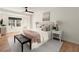 Inviting bedroom with a sitting area, soft natural light, and neutral decor for a serene atmosphere at 2148 Allgood Rd, Marietta, GA 30062