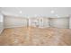 Spacious finished basement with tile flooring and recessed lighting at 2151 Zelda Ne Dr, Atlanta, GA 30345