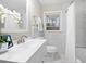 Bright bathroom with white marble and elegant fixtures at 2151 Zelda Ne Dr, Atlanta, GA 30345