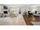 Spacious living room with fireplace, light walls, and a mix of hardwood and tile flooring at 2151 Zelda Ne Dr, Atlanta, GA 30345