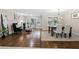 Open living space with sitting area and dining room, featuring hardwood floors and ample light at 2151 Zelda Ne Dr, Atlanta, GA 30345