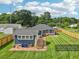 Aerial view of property showcasing the expansive yard, deck, privacy fence, and charming detached garage at 598 Taylor Se Dr, Smyrna, GA 30080