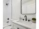 Bathroom with modern fixtures including rainfall shower head, sleek hardware, and clean, bright atmosphere at 598 Taylor Se Dr, Smyrna, GA 30080
