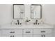 Bathroom featuring dual sinks, modern fixtures, a large mirror, and plenty of counter space at 598 Taylor Se Dr, Smyrna, GA 30080