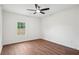 Cozy bedroom boasts natural lighting, window views, and sleek flooring perfect for relaxation and sleep at 598 Taylor Se Dr, Smyrna, GA 30080