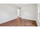 Bedroom with hardwood floors and bright natural light from the window at 598 Taylor Se Dr, Smyrna, GA 30080
