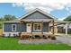 Charming craftsman-style home features a welcoming front porch and manicured lawn at 598 Taylor Se Dr, Smyrna, GA 30080