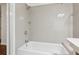 Clean bathroom featuring white subway tiles and well-maintained fixtures at 101 Swanton Hill Ct, Decatur, GA 30030
