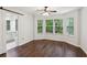 Bright bedroom with three windows, hardwood floors and an en-suite bathroom at 101 Swanton Hill Ct, Decatur, GA 30030