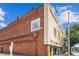 Brick building exterior with vintage signage reading 'Eddie's Attic' with some adjacent street parking at 101 Swanton Hill Ct, Decatur, GA 30030