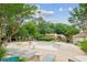A large community pool is surrounded by lounge chairs and greenery at 101 Swanton Hill Ct, Decatur, GA 30030