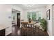 Dining area featuring a round table with four chairs and a large window seat at 101 Swanton Hill Ct, Decatur, GA 30030