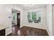 Bright dining area featuring a large window seat and hardwood floors at 101 Swanton Hill Ct, Decatur, GA 30030