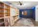 Garage featuring built-in storage shelves and plenty of workspace at 101 Swanton Hill Ct, Decatur, GA 30030
