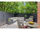 Beautiful patio with patio furniture, greenery and a brick exterior at 101 Swanton Hill Ct, Decatur, GA 30030