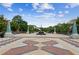 Beautiful town square with patterned brickwork, decorative posts, benches, and a central fountain at 101 Swanton Hill Ct, Decatur, GA 30030