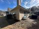 The backyard features river rock, patio seating and an external chimney at 1360 Raven Rock Nw Trl, Kennesaw, GA 30152