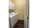 A laundry room equipped with both a washing machine and dryer at 1360 Raven Rock Nw Trl, Kennesaw, GA 30152