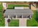 Aerial view of roof, landscaping, parking, and fencing at 150 South St, Buford, GA 30518