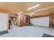 Spacious garage area features ample storage space and overhead lighting at 150 South St, Buford, GA 30518