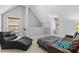 This loft area has tile flooring and neutral paint; the perfect place to relax and unwind at 150 South St, Buford, GA 30518