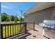 Spacious wood deck with stainless steel grill overlooking backyard at 815 Spring View Ct, Covington, GA 30014