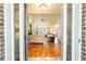 Inviting foyer with views into the open living area, beautiful hardwood floors, and vaulted ceilings at 815 Spring View Ct, Covington, GA 30014