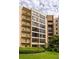 Multi-story building with manicured lawn and multiple balconies at 1800 Clairmont Lk # 216, Decatur, GA 30033