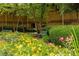 Beautiful gardens featuring colorful flowers, manicured hedges, and inviting benches at 1800 Clairmont Lk # 216, Decatur, GA 30033
