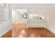 Open-concept living space with hardwood flooring seamlessly flowing into the kitchen at 1800 Clairmont Lk # 216, Decatur, GA 30033