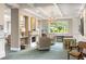Comfortable lounge area features chairs, fireplace and views of the outdoors at 1800 Clairmont Lk # 216, Decatur, GA 30033