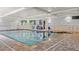 Indoor pool with tile surround and easy access steps at 1800 Clairmont Lk # 216, Decatur, GA 30033
