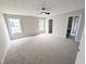 Expansive bedroom featuring plush carpeting and windows at 225 Kentshire Pl, Lawrenceville, GA 30044