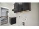 Laundry room with black cabinets, sink, and washer/dryer hookups at 591 Brashy St, Woodstock, GA 30188