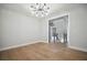Bright living room with open staircase at 591 Brashy St, Woodstock, GA 30188