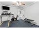 Inviting exercise room featuring workout equipment, ceiling fan for comfortable workouts at 75 Auburn Rd, Auburn, GA 30011