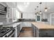 Spacious kitchen with granite countertops and stainless steel appliances at 75 Auburn Rd, Auburn, GA 30011