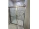 Bathroom with a marble tiled shower, sliding glass doors, and modern fixtures at 861 Pineberry Ct, Grayson, GA 30017