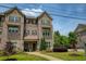 Charming townhome with brick facade, inviting entrance, and landscaping that enhances the curb appeal at 1365 Hawthorne Se Ave, Smyrna, GA 30080
