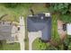 Bird's-eye view highlights the property's layout and landscaping, nestled among mature trees at 3543 Pine Grove Dr, Douglasville, GA 30135