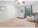 Bedroom features double closet, crib, rocking chair and window at 3543 Pine Grove Dr, Douglasville, GA 30135